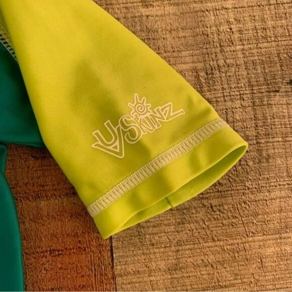 UV skins boys rashguard with surfing dinosaur in blue and green -12/18M - Picture 5 of 8